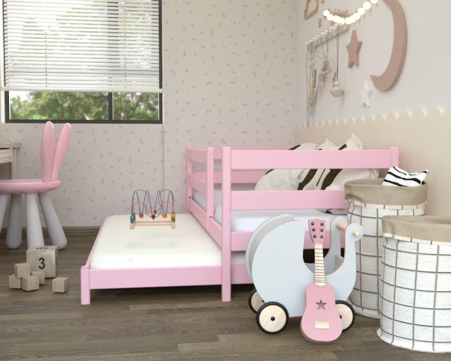 Podwójne wysuwane Łóżko CZAREK LOW pastelowo różowe dla małej damy– praktyczne i pełne uroku